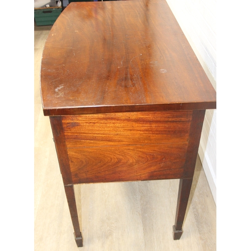 119 - A Regency period mahogany bow fronted sideboard with five drawers and brass handles, 121cm x 68cm x ... 