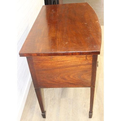 119 - A Regency period mahogany bow fronted sideboard with five drawers and brass handles, 121cm x 68cm x ... 