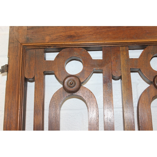 134 - A pair of Chinese style hardwood doors or panels, lattice geometric design, believed to be late 19th... 