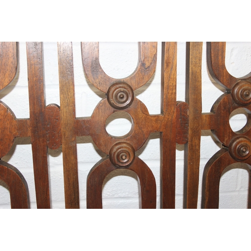 134 - A pair of Chinese style hardwood doors or panels, lattice geometric design, believed to be late 19th... 