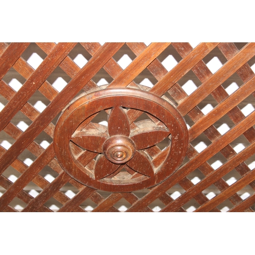 134 - A pair of Chinese style hardwood doors or panels, lattice geometric design, believed to be late 19th... 