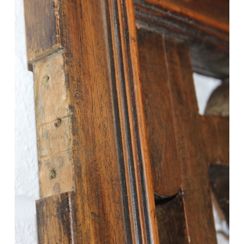 134 - A pair of Chinese style hardwood doors or panels, lattice geometric design, believed to be late 19th... 