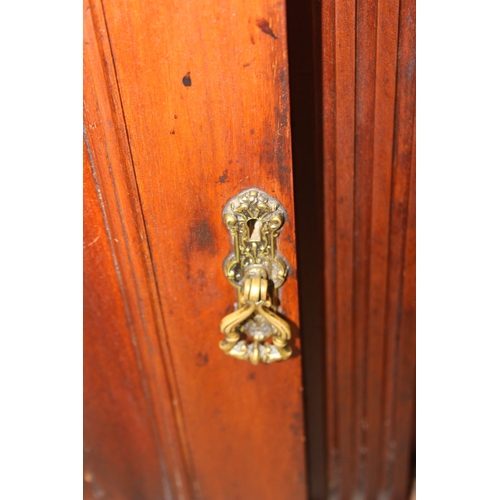 147 - Art Nouveau period mahogany sideboard with overmantel mirror, two drawers over heavily carved cupboa... 