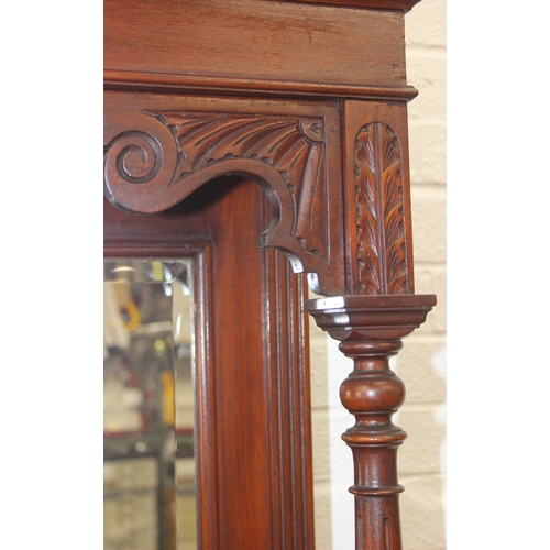 147 - Art Nouveau period mahogany sideboard with overmantel mirror, two drawers over heavily carved cupboa... 