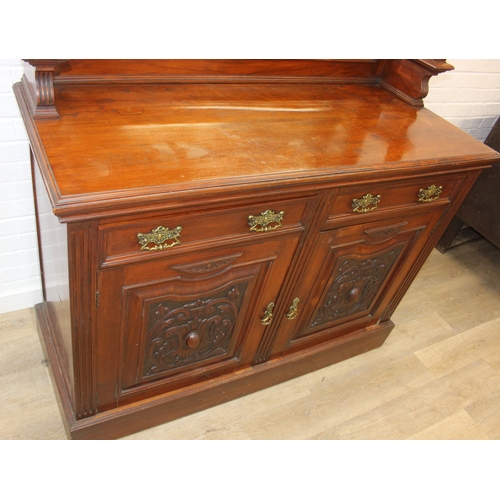 147 - Art Nouveau period mahogany sideboard with overmantel mirror, two drawers over heavily carved cupboa... 