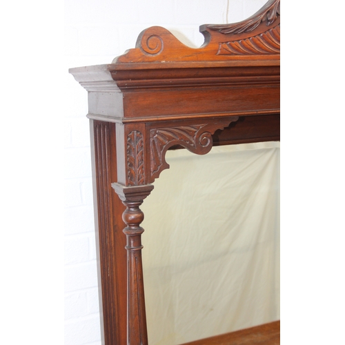 147 - Art Nouveau period mahogany sideboard with overmantel mirror, two drawers over heavily carved cupboa... 