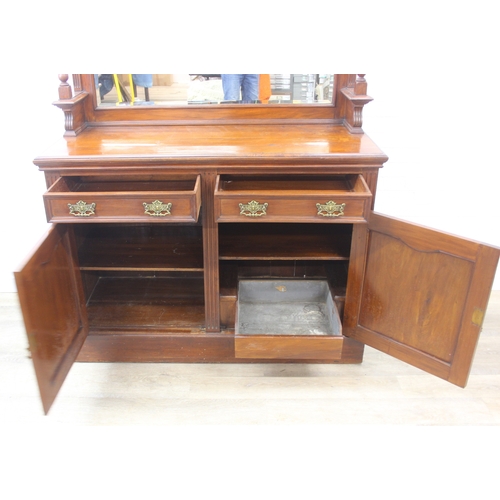 147 - Art Nouveau period mahogany sideboard with overmantel mirror, two drawers over heavily carved cupboa... 