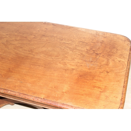 155 - A 19th century mahogany low table with decorative pedestal base, 127cm x 66cm x 49cm