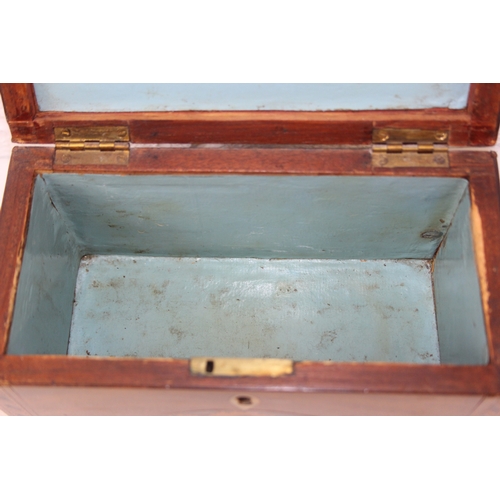 204 - A Georgian Sheraton inlaid mahogany tea caddy with inlaid shell motifs and decorative border, lackin... 