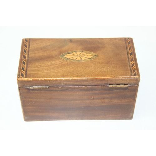 204 - A Georgian Sheraton inlaid mahogany tea caddy with inlaid shell motifs and decorative border, lackin... 
