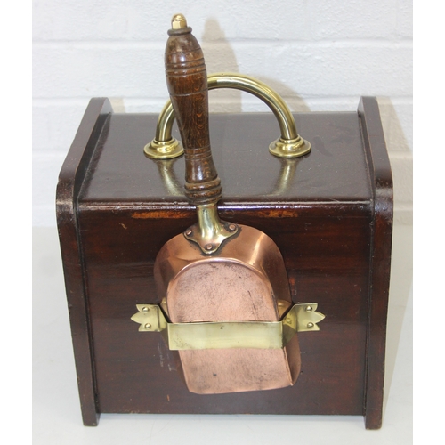 209 - An antique mahogany coal scuttle with polished brass fittings and shovel, 30cm wide x 44cm deep