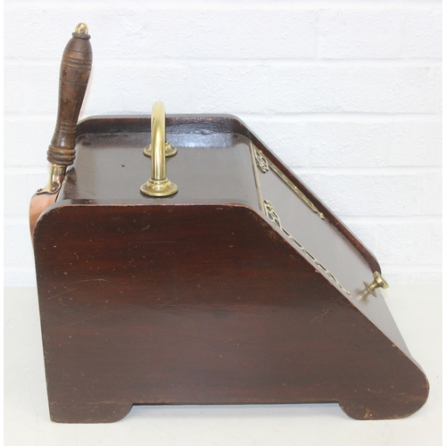 209 - An antique mahogany coal scuttle with polished brass fittings and shovel, 30cm wide x 44cm deep