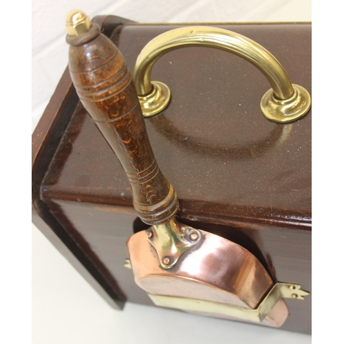 209 - An antique mahogany coal scuttle with polished brass fittings and shovel, 30cm wide x 44cm deep