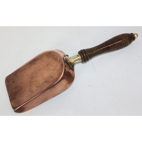 209 - An antique mahogany coal scuttle with polished brass fittings and shovel, 30cm wide x 44cm deep