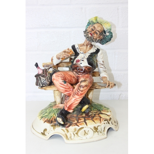 280 - Two decorative figural table lamps with shades, one by B. Merti, the other Capodimonte and a Capodim... 