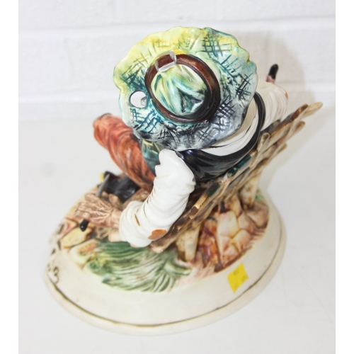 280 - Two decorative figural table lamps with shades, one by B. Merti, the other Capodimonte and a Capodim... 