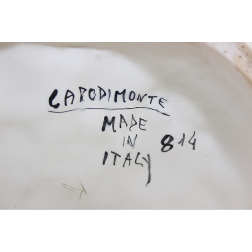 280 - Two decorative figural table lamps with shades, one by B. Merti, the other Capodimonte and a Capodim... 