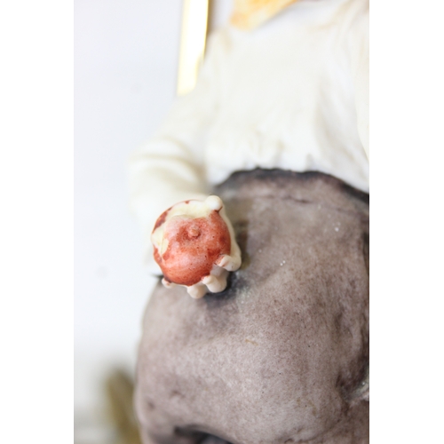 280 - Two decorative figural table lamps with shades, one by B. Merti, the other Capodimonte and a Capodim... 