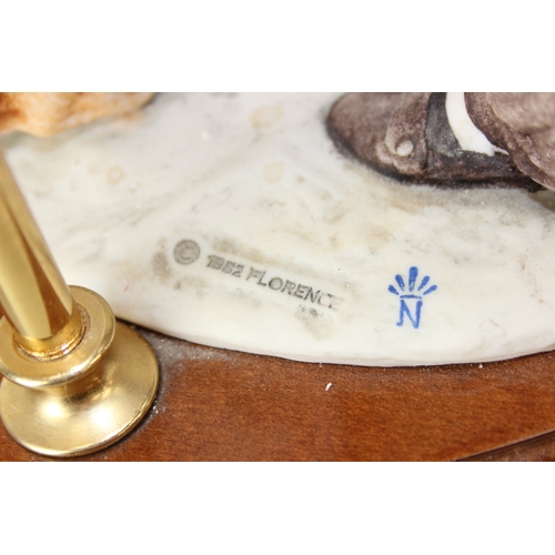 280 - Two decorative figural table lamps with shades, one by B. Merti, the other Capodimonte and a Capodim... 