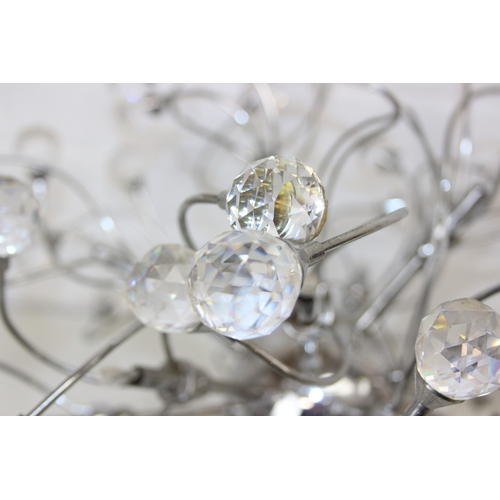 316 - A retro style pendant light with chrome twisted body mounted with crystals, 60cm in diameter