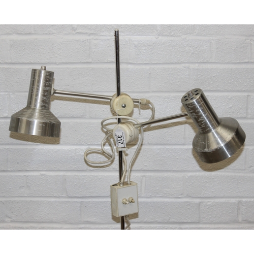 317 - A retro floor standing pole lamp with aluminium shades, 144cm tall