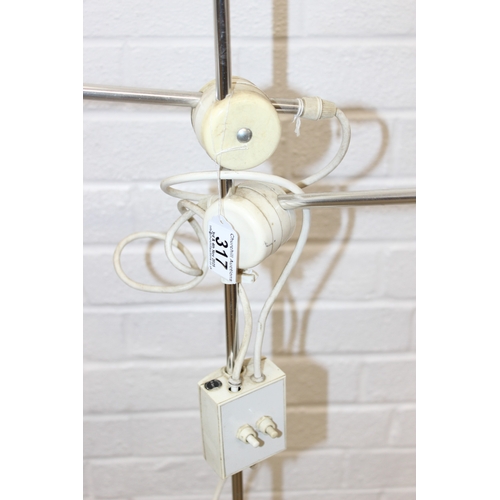 317 - A retro floor standing pole lamp with aluminium shades, 144cm tall