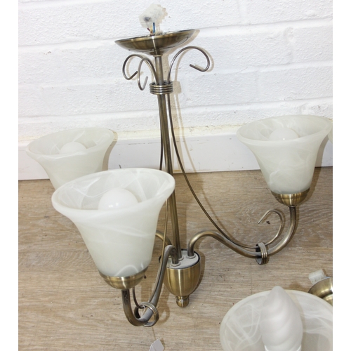 325 - A qty of matching light fittings, all with brushed copper effect bodies and marble effect glass shad... 