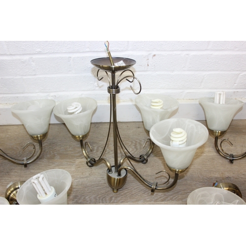 325 - A qty of matching light fittings, all with brushed copper effect bodies and marble effect glass shad... 