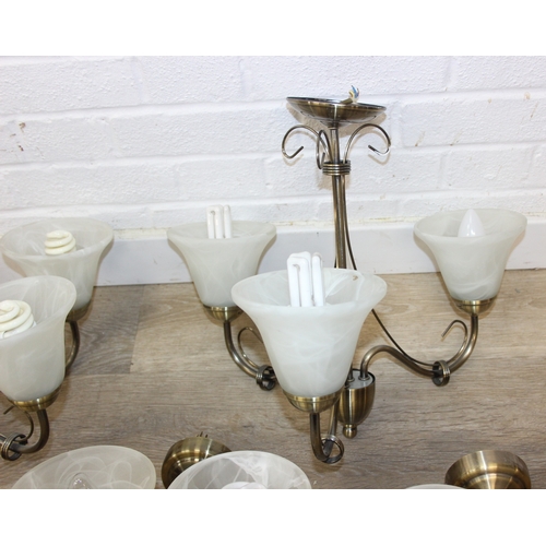 325 - A qty of matching light fittings, all with brushed copper effect bodies and marble effect glass shad... 