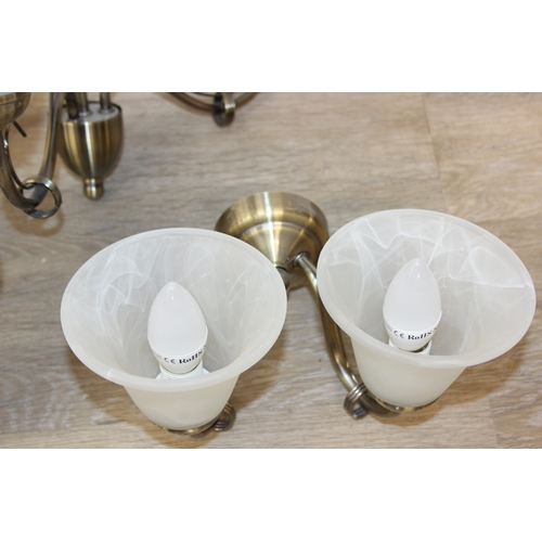 325 - A qty of matching light fittings, all with brushed copper effect bodies and marble effect glass shad... 