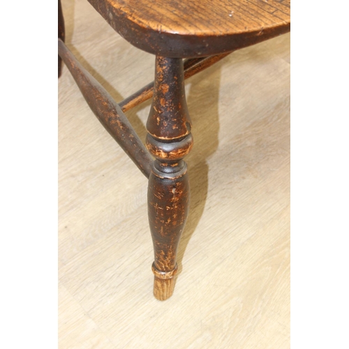 169 - Antique slat back farmhouse Windsor armchair with elm seat, 62cm wide x 101cm tall