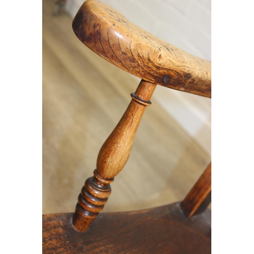 169 - Antique slat back farmhouse Windsor armchair with elm seat, 62cm wide x 101cm tall