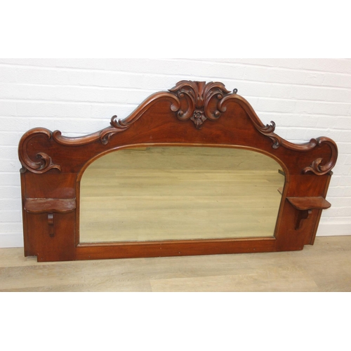 445B - Antique over mantle mirror in mahogany frame with carved details and two display shelves, 165cm x 99... 