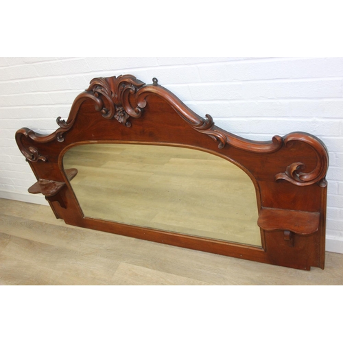 445B - Antique over mantle mirror in mahogany frame with carved details and two display shelves, 165cm x 99... 