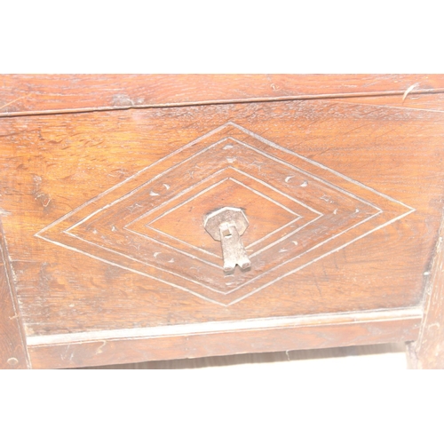 108 - An antique oak cellarette or coal bucket with metal lining, seemingly made from parts of an 18th cen... 