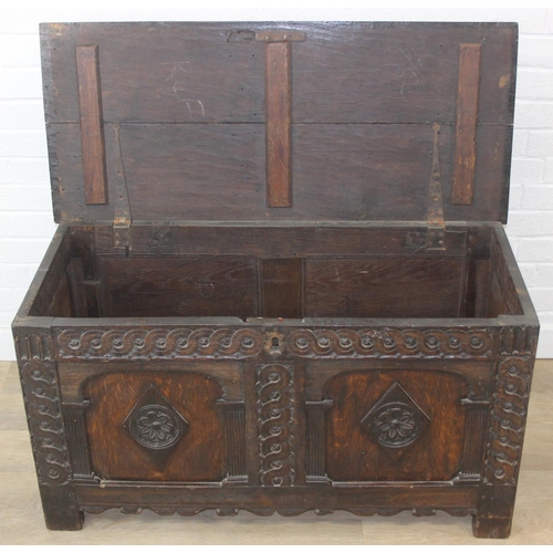 102 - An antique carved oak coffer, likely 18th century with carved details, unusual small size, 94cm x 46... 