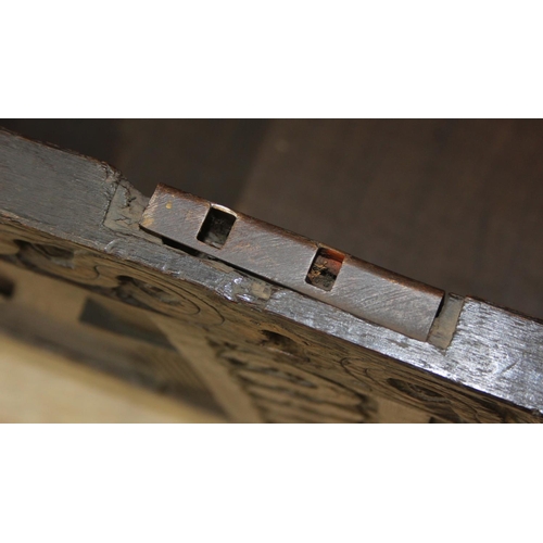 102 - An antique carved oak coffer, likely 18th century with carved details, unusual small size, 94cm x 46... 