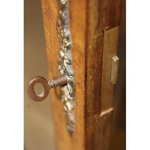 101 - A Victorian walnut and marquetry inlaid pier cabinet or glazed bookcase with gilt metal mounts, two ... 