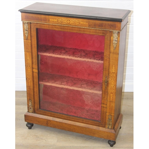 100 - A Victorian walnut and marquetry inlaid pier cabinet or glazed bookcase with gilt metal mounts, two ... 