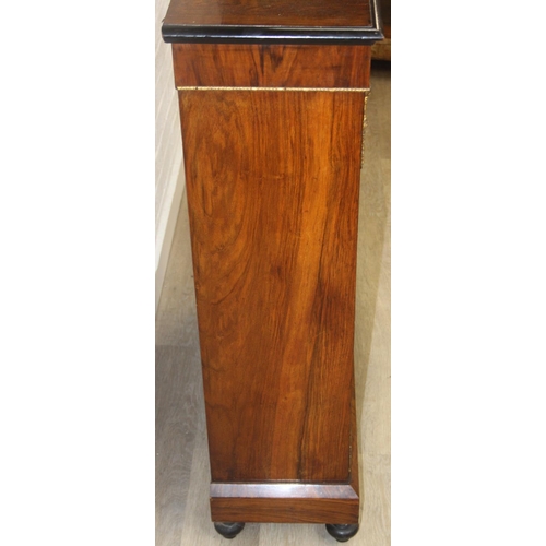 100 - A Victorian walnut and marquetry inlaid pier cabinet or glazed bookcase with gilt metal mounts, two ... 