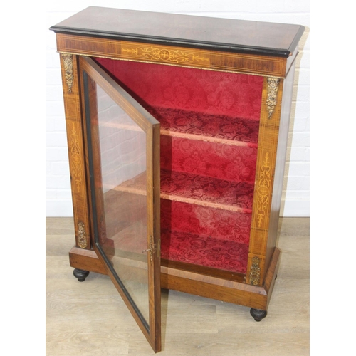 100 - A Victorian walnut and marquetry inlaid pier cabinet or glazed bookcase with gilt metal mounts, two ... 