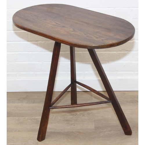 45 - An unusual oak topped table with three legged base, possibly a cricket table, 71cm x 42cm x 67cm