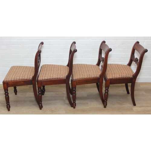 83 - A set of four Regency period mahogany dining chairs with carved back and turned legs, brown palette ... 