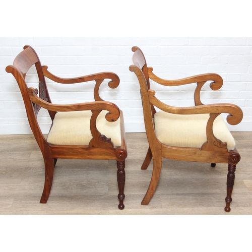 90 - A pair of antique carver armchairs with carved backs and turned legs, decorative scroll arms, gold c... 