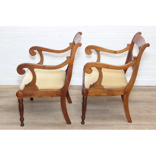 90 - A pair of antique carver armchairs with carved backs and turned legs, decorative scroll arms, gold c... 
