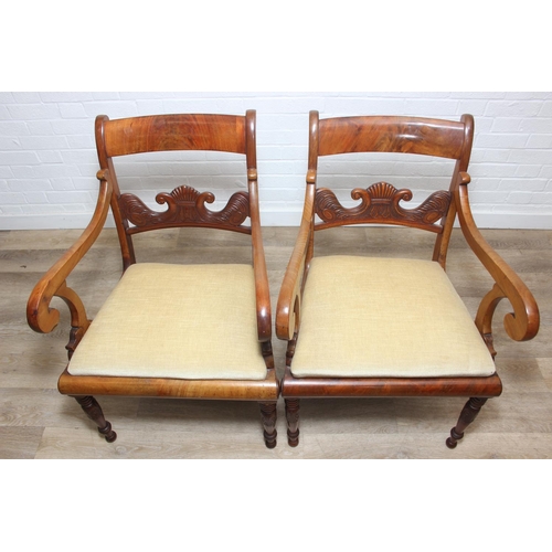 90 - A pair of antique carver armchairs with carved backs and turned legs, decorative scroll arms, gold c... 