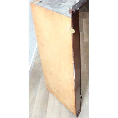 69 - A Georgian mahogany corner cupboard with a central drawer to bottom frieze flanked by two faux drawe... 