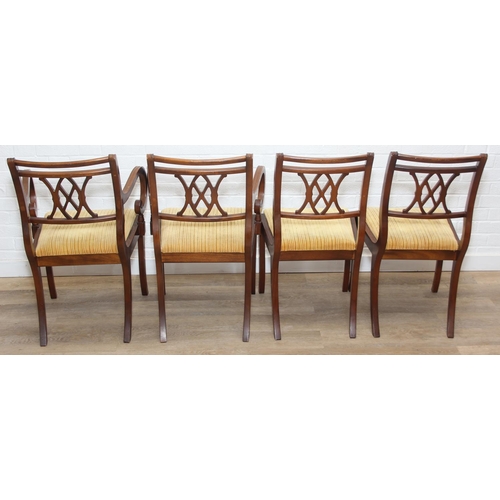 85 - A set of four Regency style mahogany chairs by Abel's International, the carvers 55cm wide x 87cm ta... 