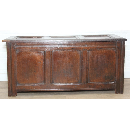 89 - An 18th century oak coffer with iron fittings and panelled design, 125cm x 53cm x 57cm