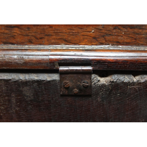 89 - An 18th century oak coffer with iron fittings and panelled design, 125cm x 53cm x 57cm